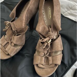 Gorgeous bronze metallic Coach heels. Gently used- worn 2 -3 times.